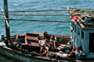 Refugees escaping on a boat